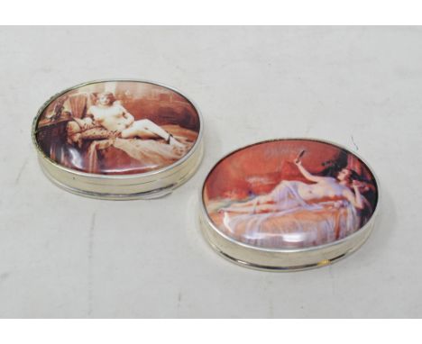 Two silver and enamel pill boxes, decorated nudes 