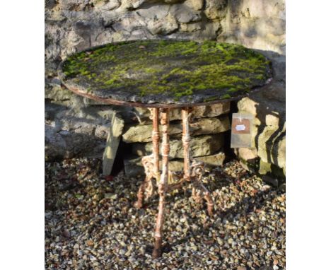 A Victorian cast iron garden occasional table, on three legs, 83.5 cm diameter 