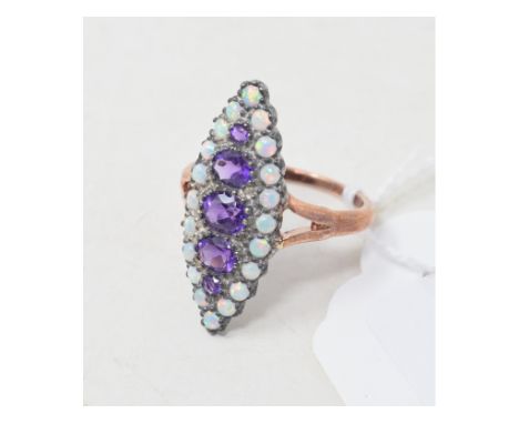 A 15ct gold, amethyst and opal ring 