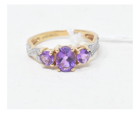 A 9ct gold, amethyst and diamond ring, approx. ring size MReport by RBApprox. 2.3 g 