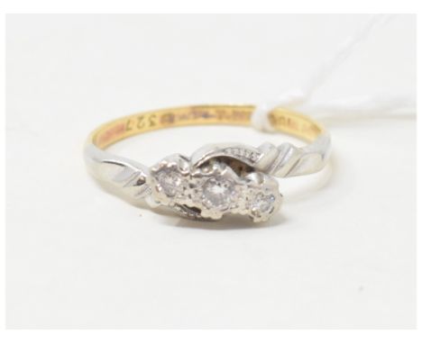 An 18ct gold and three stone diamond ring, approx. ring size MApprox. 2.5 g 