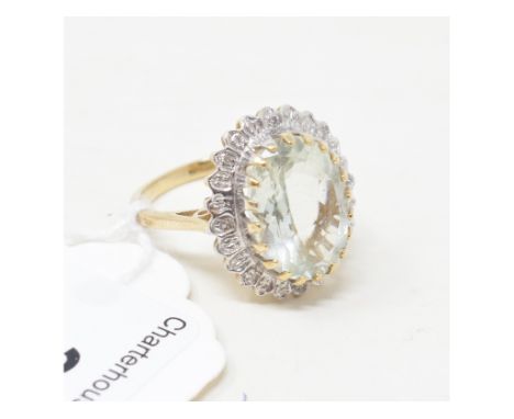 A 9ct gold, green amethyst and diamond ring 