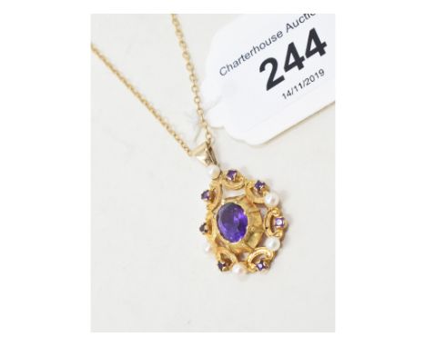 A 9ct gold, amethyst and seed pearl pendant, on a 9ct gold chainApprox. 6.5 g (all in) 