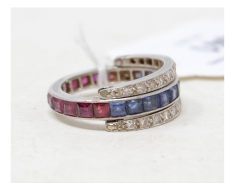 EXTRA LOT:  A white metal, ruby, diamond and sapphire eternity flip ringReport by GHApprox. ring size is L.Condition is gener