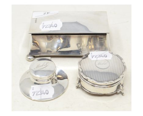 EXTRA LOT: A silver ring box, in the form of a casket, 11 cm wide, Birmingham 1915, 4.30 ozt, a silver inkwell and a silver t