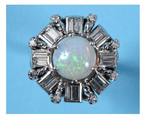 An 18ct white gold and platinum mounted opal and diamond cluster ring, with brilliant and baguette cut diamonds, approx. ring