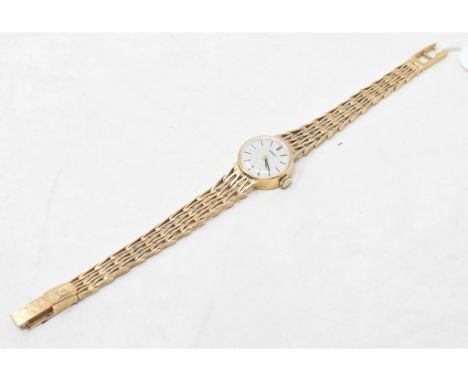 A lady's 9ct gold Tissot wristwatch, with baton indicesApprox. 19.4 g (all in) 