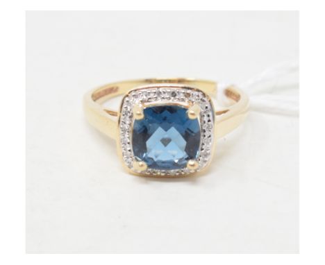 A 10ct gold, blue topaz and diamond cluster ring, approx. ring size RReport by RBApprox. 3.1 g 