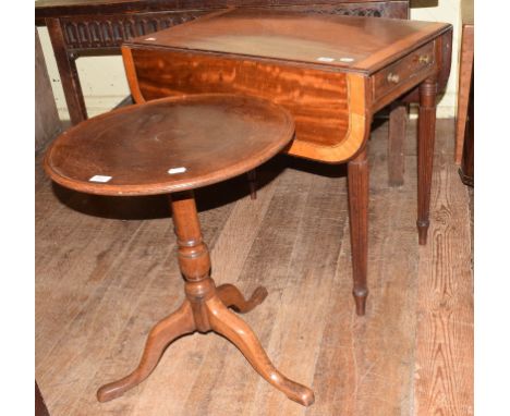 An early 19th century mahogany Pembroke table, crossbanded in satinwood, on tapering reeded legs, 97 cm wide, and a mahogany 