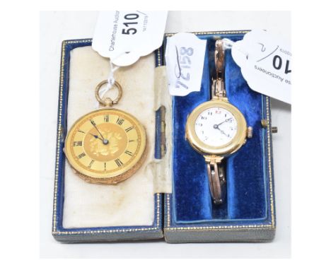 A 14ct gold open face pocket watch, and a lady's 9ct gold wristwatch, boxed (2)Report by GHThe pocket watch has its glass det