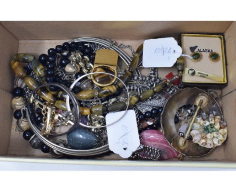 A silver coloured metal necklace, other necklaces, a pair of jade earrings and other jewellery 