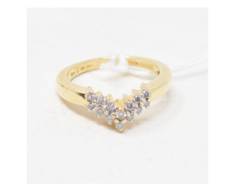 An 18ct gold and diamond wishbone ring, approx. ring size M½Report by RBApprox. 4.6 g 