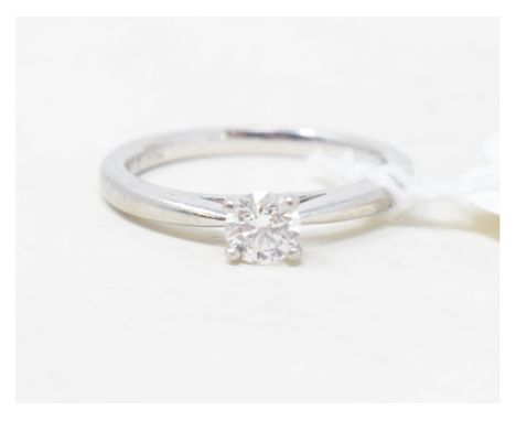 A platinum and diamond solitaire ring, with a diamond report stating 0.31 ct, approx. ring size KReport by RBApprox. 3.8 g 