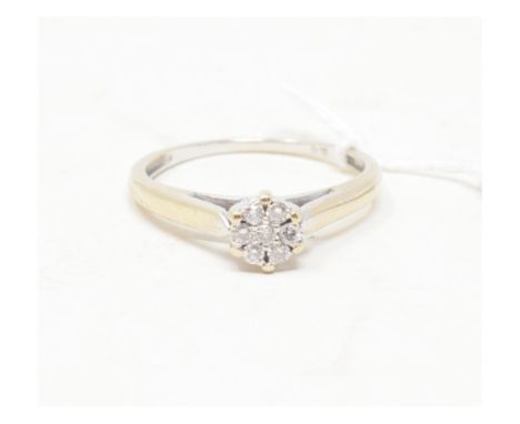 An 18ct white gold and diamond daisy flowerhead ring, approx. ring size OReport by RBApprox. 2.4 g 