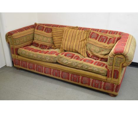 A chesterfield type sofa, with patterned upholsteryReport by GH215 cm wide 105 cm deep 75 cm high 