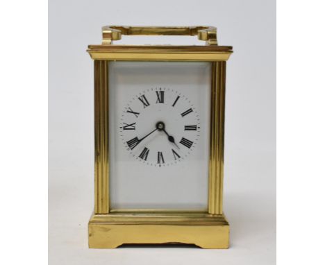 A brass carriage clock, 15 cm high 