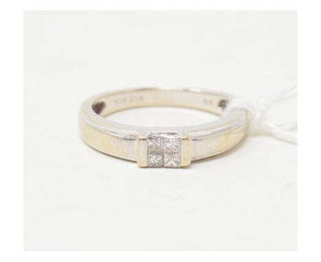 An 18ct white gold ring, set four Princess cut diamonds, approx. ring size KReport by RBApprox. 2.9 g 