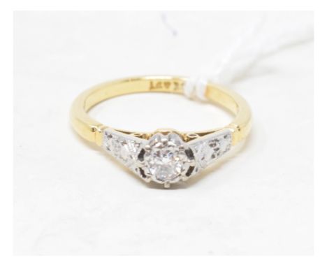 An 18ct gold and diamond solitaire ring, with diamonds to the shoulders, approx. ring size H½Report by RBApprox. 2.6 g 