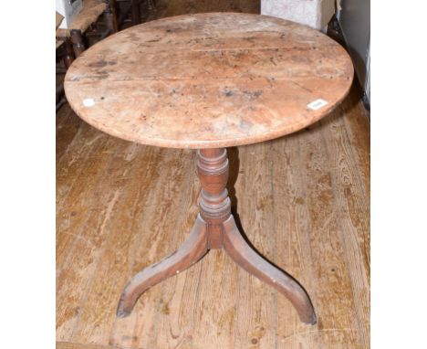 A 19th century elm tripod table, 64 cm diameterProvenance: From the Estate of the Late Dame Elisabeth Frink 