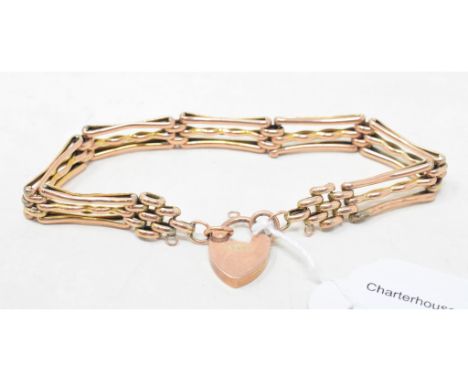 A 9ct gold gate-link bracelet, with a padlock clasp, approx. 9.4 g 