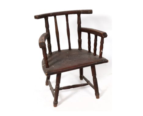 A late 19th century rustic painted stick back armchair, with turned spindles See illustrationProvenance: From the Estate of t