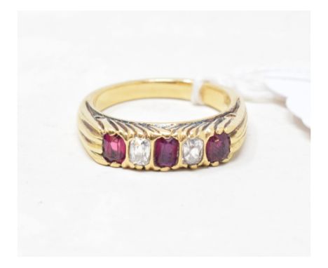 A yellow coloured metal, diamond and ruby half hoop ring, approx. ring size N½, unmarked 