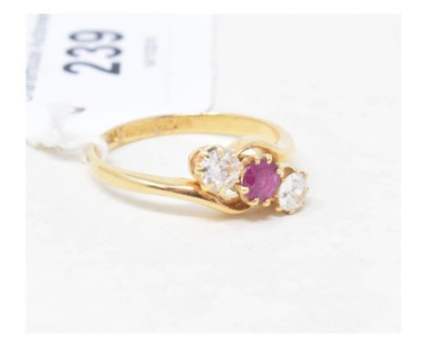 An 18ct gold, diamond and ruby three stone ring, approx. ring size S½ 