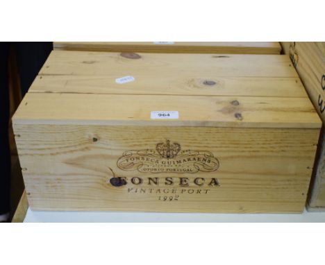 Six bottles of Fonseca vintage port, 1992, rated 97/100 by Robin Parker, in unopened own wooden case 