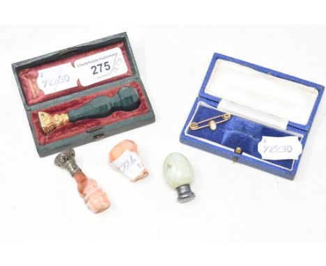 A seal, with a hardstone handle, cased, another, damaged, an opal bar brooch, and a Victorian silver mounted scent bottle, in