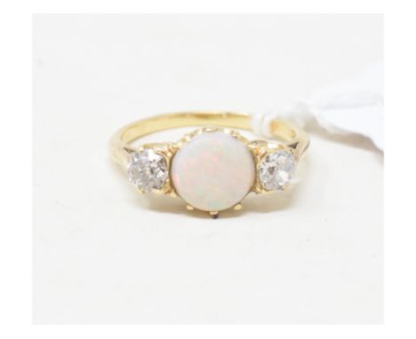 A yellow coloured metal, opal and diamond ring, approx. ring size H, apparently unmarked 