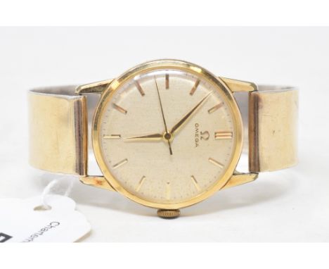 A gentleman's gold plated Omega wristwatch, having baton indices and centre seconds, in an associated Omega box 