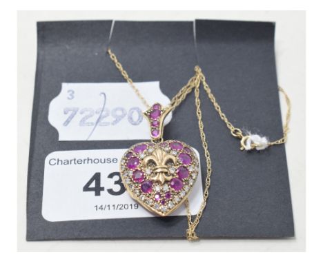 A 9ct gold, ruby and diamond heart locket, on a 9ct gold chain 