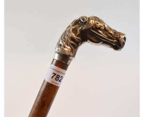 A walking stick, the silver handle in the form of a horses head, London 1888 