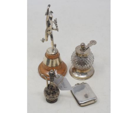A silver figure, of Hermes, Birmingham 1976, approx. 3.5 ozt, on an oak stand, 17 cm high, a silver vesta case, a silver moun
