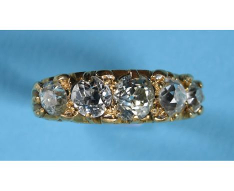 An 18ct gold and five stone diamond ring, in a pierced mount, approx. 3ct, approx. ring size M See illustration 