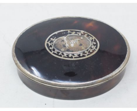 A 19th century oval tortoiseshell snuff box, with inlaid decoration, some loss/slight damage, 10 cm wide 