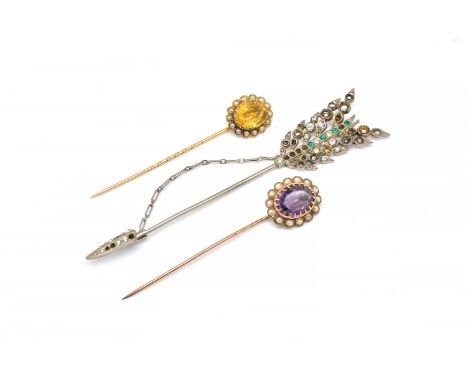 TWO STICK PINS AND A JABOT PIN (3)Comprising; a Victorian gold stick pin, mounted with an oval cut amethyst within a surround