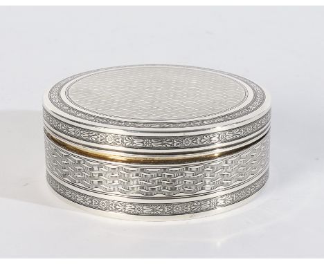 A FRENCH CIRCULAR BOX AND COVER (2)Gilt within, the exterior engine turned within decorated borders, diameter 8cm, weight 107