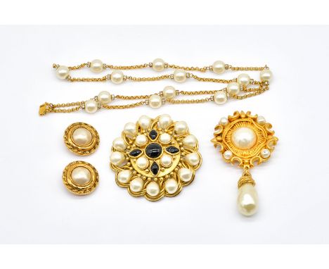 FOUR ITEMS OF GILT METAL AND IMITATION PEARL CHANEL JEWELLERY (4)Comprising; a large shaped circular brooch, mounted with imi
