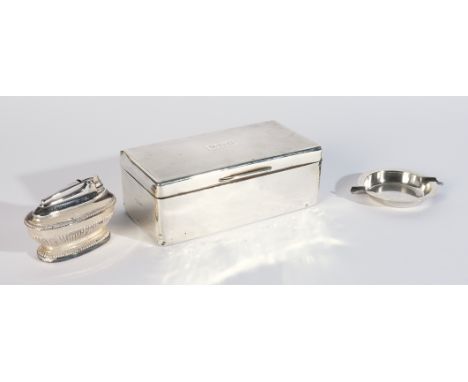 THREE ITEMS OF SMOKING INTEREST (3)Comprising; a rectangular silver table cigarette box, the lid with engine turned decoratio