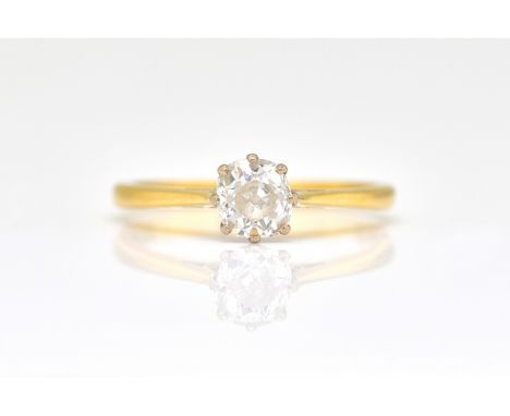 A GOLD AND DIAMOND SINGLE STONE RINGClaw set with a cushion shaped diamond, ring size M, gross weight 2.3 gms