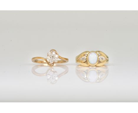 TWO 9CT GOLD AND GEM SET RINGS (2)Comprising;  a 9ct gold and diamond seven stone cluster ring, claw set with circular cut di