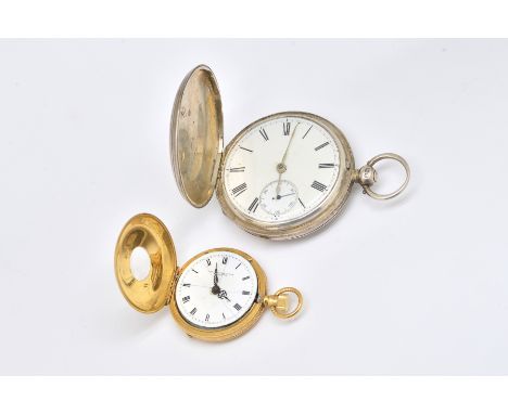 AN 18CT GOLD KEYLESS WIND, HALF HUNTING CASED FOB WATCH AND A SILVER HUNTING CASED POCKET WATCH (2)The gold fob watch with an