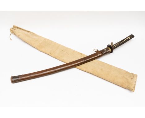 JAPANESE MEIJI PERIOD (1868-1912) STEEL KATANA SWORDThe steel blade, 66cm long, with pierced iron Tsuba, cord wrapped ray ski