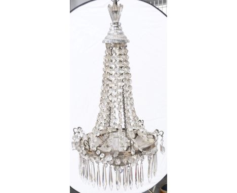 AN ENGLISH SILVERED-METAL MOUNTED GLASS LUSTRE CHANDELIERCirca 1920With moulded glass canopy over strings of faceted glass de