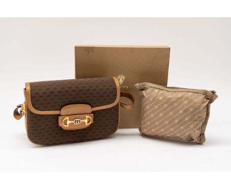 GUCCI- A HORSEBIT 1955 SHOULDER BAG AND A TRAVEL DUFFEL CASE IN BAG (2)With Gucci box and tissue paperHorsebit 1955 bag with 