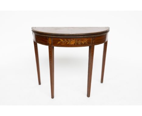 A GEORGE III MARQUETRY INLAID DEMI-LUNE FOLD OVER CARD TABLE90cm wide; 44cm deep; 74cm highCondition report:&nbsp;The marquet