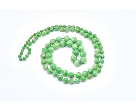 A SINGLE ROW NECKLACE OF JADE BEADSThe spherical jade beads graduating in size to the front, gross weight 62 gms