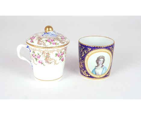 A SEVRES STYLE CUP AND COVER  (3)Late 19th centuryEnamelled with pink roses, the cover with gilt fruit finial, blue painted m