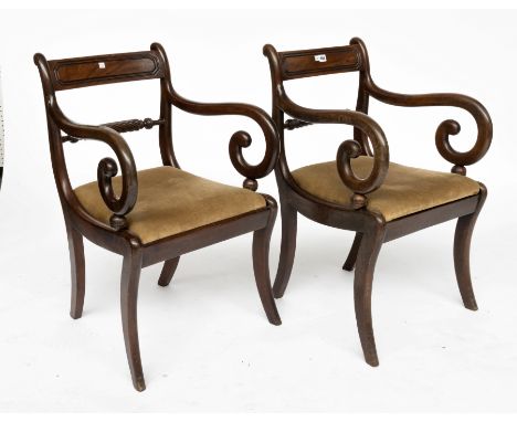 A PAIR OF LATE REGENCY MAHOGANY ARMCHAIRS OR CARVERS (2)With ropetwist horizontal splat and scroll arms, 52cm wideCondition r